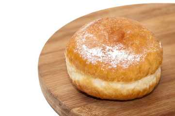 Donut stuffed with vanilla cream