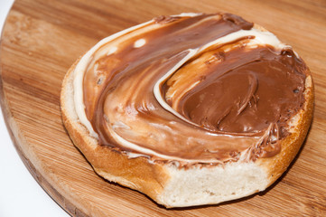 Bread with melted chocolate cream
