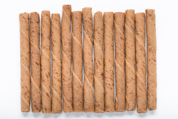 Chocolate wafer sticks isolated on white background.