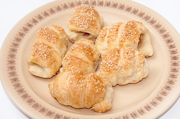 Puff pastry with meat served on the plate