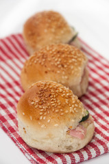 Burger sandwiches on the kitchen table cloth