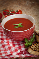 Fresh tomato soup garnished with basil