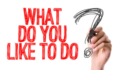 Hand with marker writing: What Do You Like to Do?