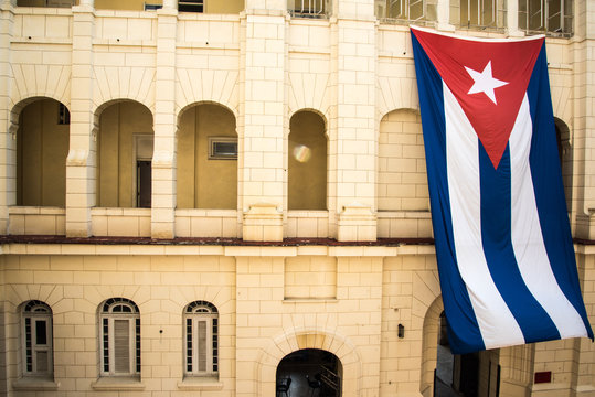 Cuban flag on colonial building in Havana, Cuba