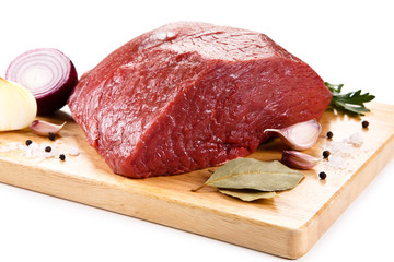 Fresh raw beef on cutting board on white background 