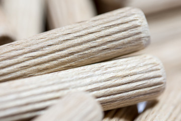 Close macro view of wooden dowels
