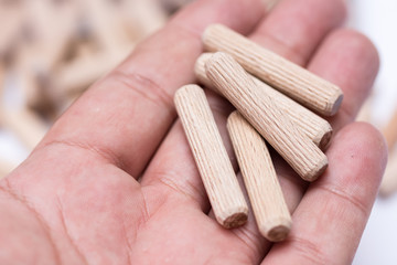 Wooden dowels in the hand