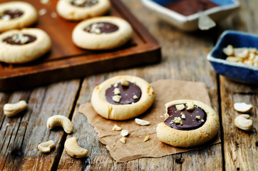 cashews butter cookies with cashews and chocolate frosting