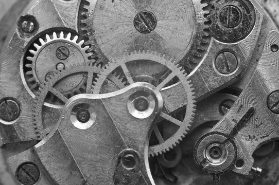 Black-and-white Metal Cogwheels in Oldest Clockwork, Macro.