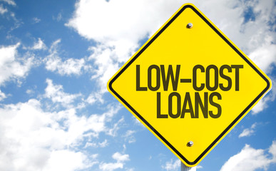 Low-Cost Loans sign with sky background