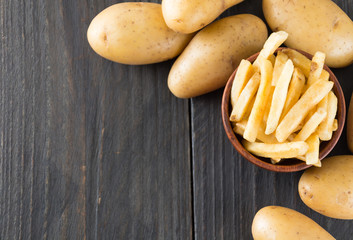 french fries on wood background