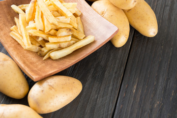 french fries on wood background