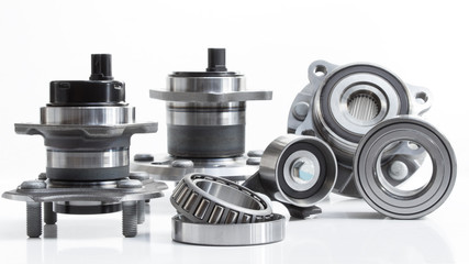 various Friction bearings lie on a gray background