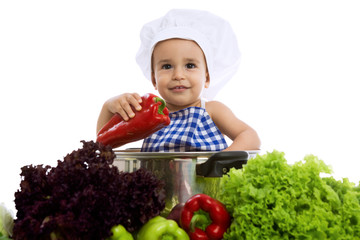 Happy smiling baby chef in pot