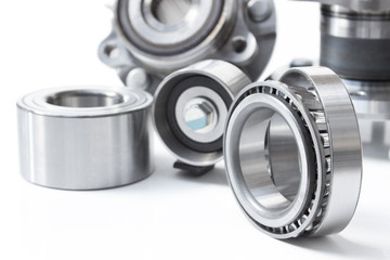 various Friction bearings lie on a gray background