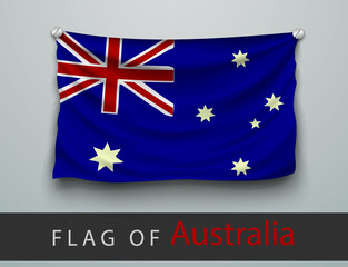 Obraz na płótnie Canvas FLAG OF australia battered, hung on the wall