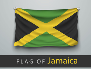Fototapeta premium FLAG OF jamaica battered, hung on the wall, screwed screws