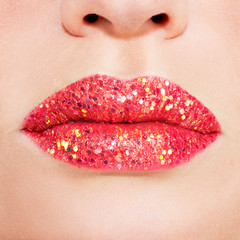 beautiful female lips with shiny red gloss lipstick