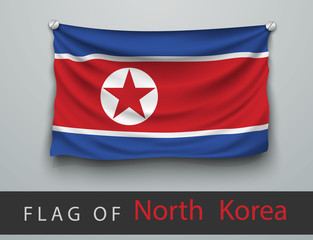 FLAG OF north korea  battered, hung on the wall