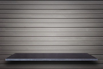 Empty top of natural stone shelves and wooden wall background