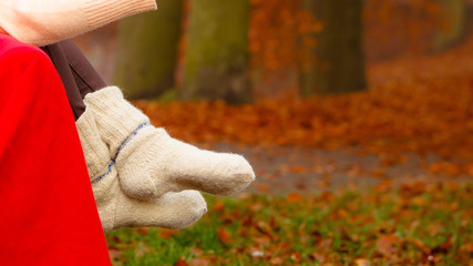 Autumn fashion. Female legs in warm socks outdoor