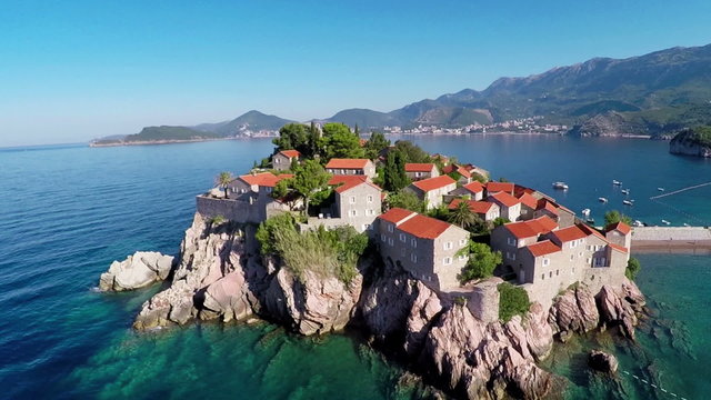 Flying over the island of Sveti Stefan, Montenegro, the Balkans - aerial photography
