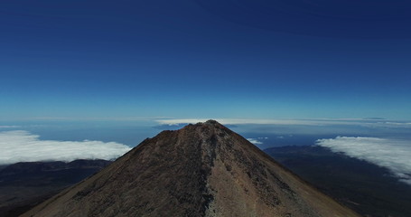 AERIAL. Greatest of nature. Reaching the top of Mount Teide vulcano. National Park, Tenerife, Canary Islands, Spain (the highest point (3718 metres) above sea level in the islands of the Atlantic). 4k