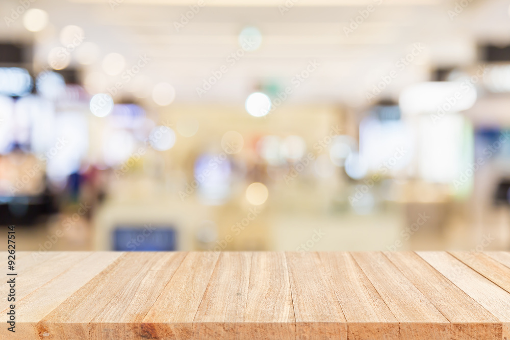 Wall mural empty top wooden table and blur with bokeh background