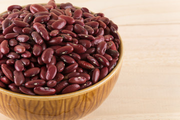 red  beans on wood background