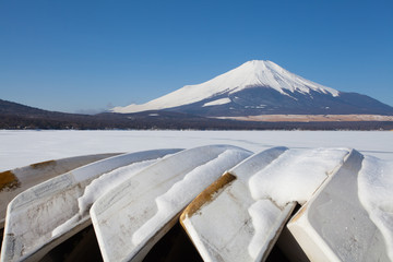 Mountain fuji and Ice lake in winter at Yamanakako lake ,Yamanashi