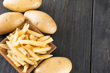 french fries on wood background