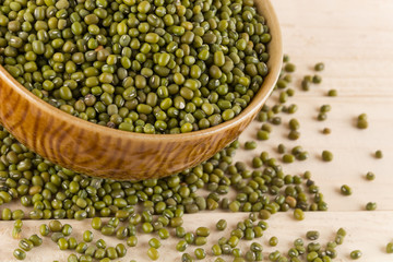 green beans on wood background