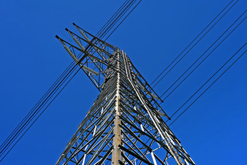 High voltage electric tower on sky background