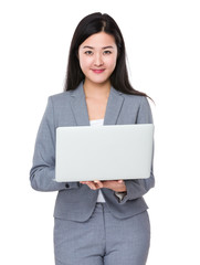 Young businesswoman use of the notebook computer