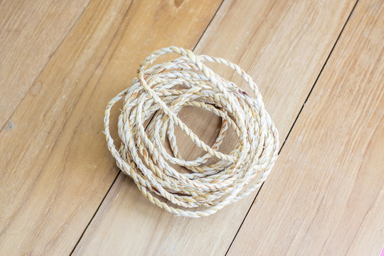 roll rope on wooden board