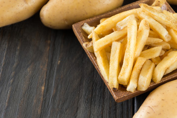 french fries on wood background