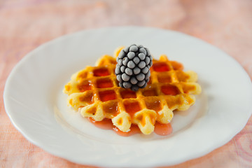 Waffle with berries and jam