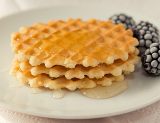 Waffle with berries and jam