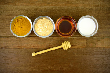 Facial mask with Tanaka(Naringi crenulata (Roxb.) Nicolson),  fresh milk, turmeric powder and honey.