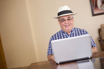 senior man working on a computer