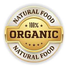 Gold natural food badge on white background