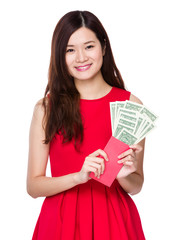 Chinese Woman hold red pocket with USD