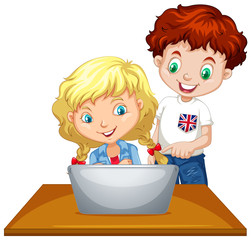 Boy and girl using computer