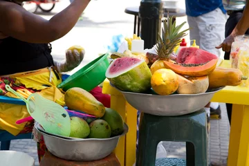 Zelfklevend Fotobehang fresh fruit at a traditional cartagena street vendors store © michael spring