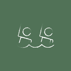 Synchronized swimming icon drawn in chalk.