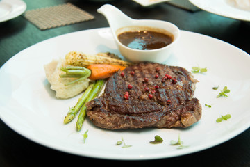 Grilled steaks with Pepper sauce