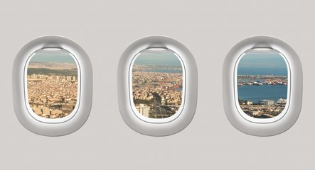 Looking out the windows of a plane to the city of Istanbul