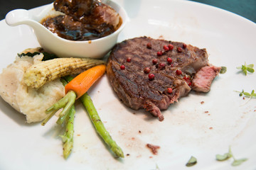 Grilled steaks with Pepper sauce