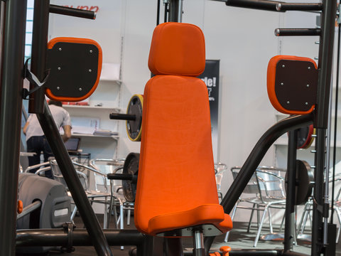 Orange Pectoral Machine for Fitness Exercise