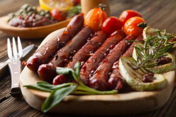 Grilled sausages with vegetables